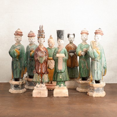 Lot 61 - A collection of eight Chinese sancai-glazed figures