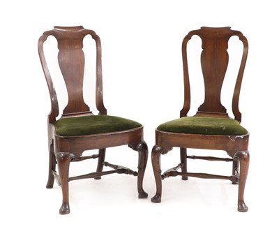 Lot 522 - A pair of George II 'red walnut' chairs