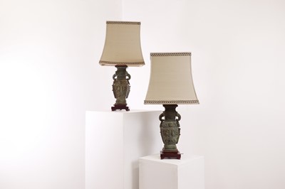 Lot 303 - A pair of archaistic bronze table lamps