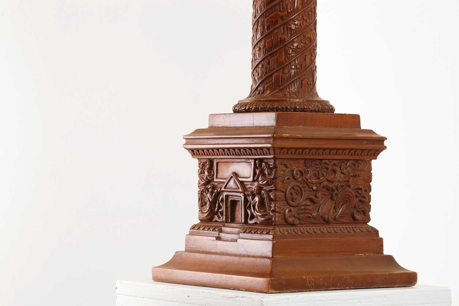 Lot 96 - A grand tour carved walnut model of Trajan's