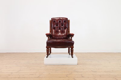 Lot 143 - A Victorian walnut library armchair