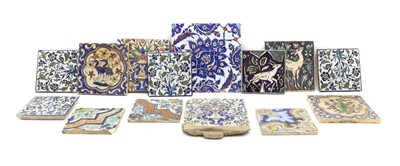 Lot 185 - A collection of pottery tiles