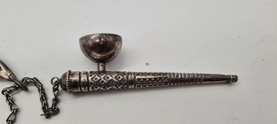 Lot 74 - An Omani silver powder horn
