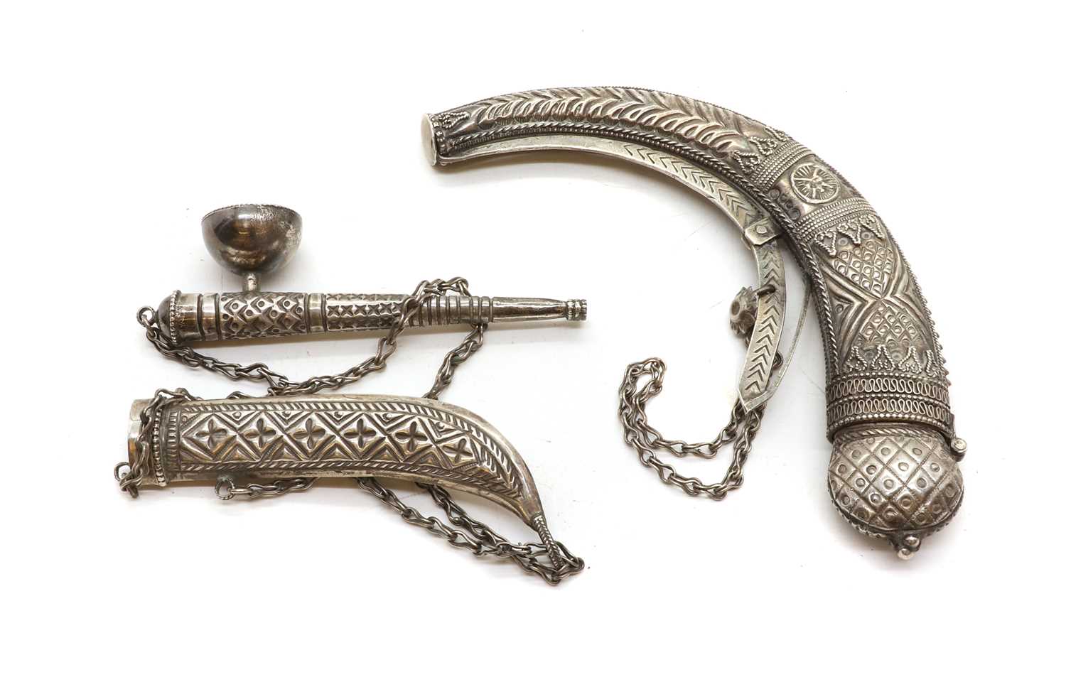 Lot 74 - An Omani silver powder horn