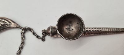Lot 74 - An Omani silver powder horn