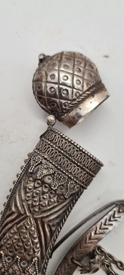 Lot 74 - An Omani silver powder horn