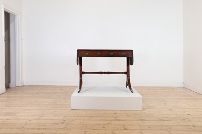 Lot 130 - A Regency mahogany and rosewood banded sofa table