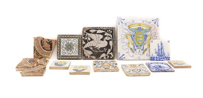 Lot 184 - A collection of pottery tiles
