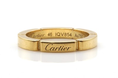 Lot 277 - An 18ct gold Cartier Lanieres brick link band ring