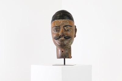 Lot 202 - A carved wood and painted mask