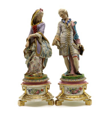 Lot 131 - A large pair of continental bisque figures