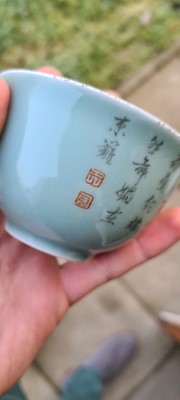 Lot 80 - A Chinese celadon glazed tea bowl