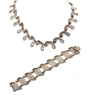 Lot 453 - A sterling silver Mexican necklace and bracelet suite, by Antonio Reina for Taxco, c.1945