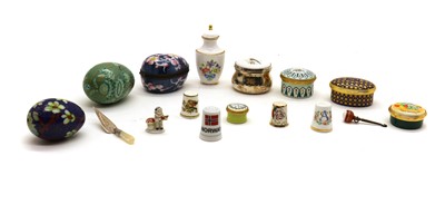 Lot 193 - A collection of enamel pill boxes