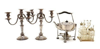 Lot 25 - A silver-plated pair of three-light candelabras