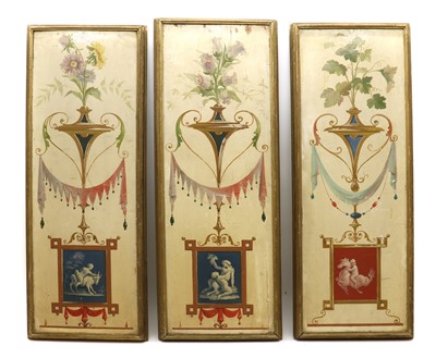 Lot 246 - A set of three Neoclassical painted panels