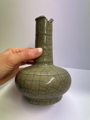 Lot 79 - A Chinese celadon glazed bottle vase