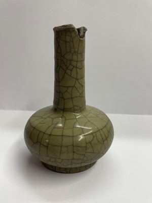 Lot 79 - A Chinese celadon glazed bottle vase