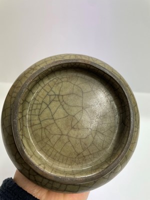 Lot 79 - A Chinese celadon glazed bottle vase