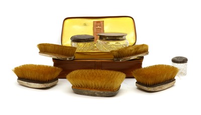 Lot 51 - A silver-mounted dressing table set