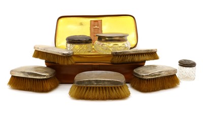 Lot 51 - A silver-mounted dressing table set