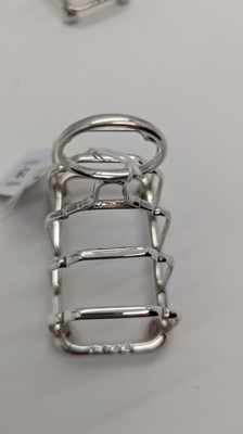 Lot 19 - A Victorian silver four division toast rack