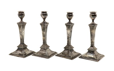 Lot 2 - A set of four silver candlesticks