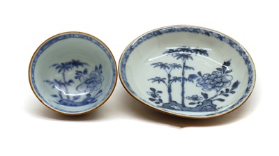 Lot 86 - A Chinese Nanking Cargo blue and white porcelain tea bowl and saucer