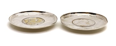 Lot 52 - A pair of silver coin dishes