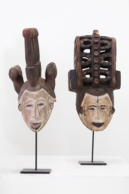 Lot 206 - A set of six carved and painted wooden Igbo helmet masks