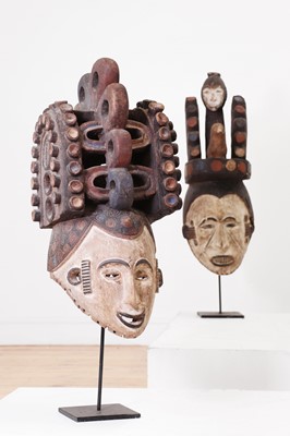 Lot 206 - A set of six carved and painted wooden Igbo helmet masks