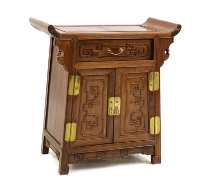 Lot 396 - A Chinese hardwood cabinet or altar table