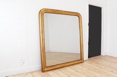 Lot 299 - A large giltwood overmantel mirror