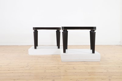 Lot 301 - A pair of ebonised occasional tables