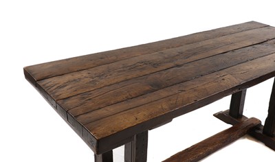 Lot 310 - An oak refectory table