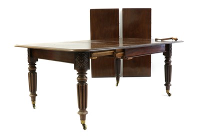 Lot 323 - A Regency mahogany extending dining table