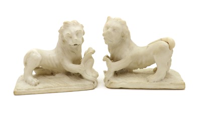 Lot 181 - A pair of heraldic alabaster lions