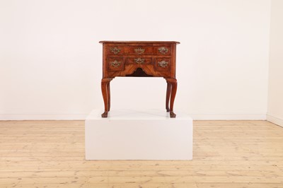 Lot 55 - A walnut lowboy