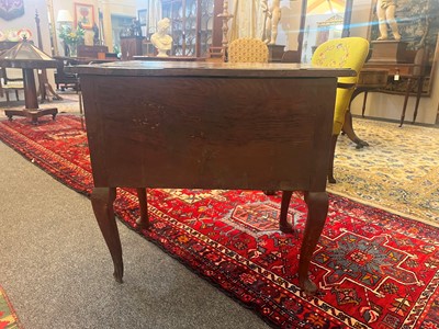 Lot 55 - A walnut lowboy