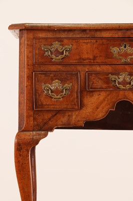 Lot 55 - A walnut lowboy