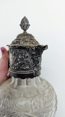 Lot 3 - A late Victorian silver mounted cut glass claret jug