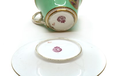 Lot 211 - A Royal Worcester porcelain cup and saucer