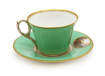 Lot 211 - A Royal Worcester porcelain cup and saucer