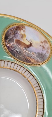 Lot 211 - A Royal Worcester porcelain cup and saucer