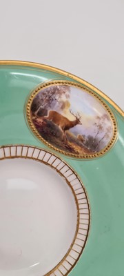 Lot 211 - A Royal Worcester porcelain cup and saucer