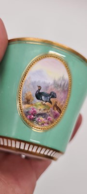 Lot 211 - A Royal Worcester porcelain cup and saucer