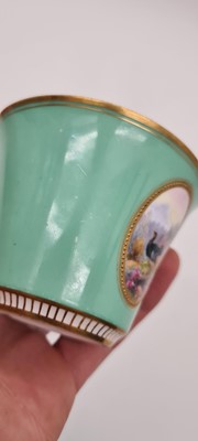 Lot 211 - A Royal Worcester porcelain cup and saucer