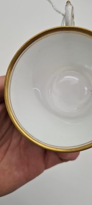 Lot 211 - A Royal Worcester porcelain cup and saucer