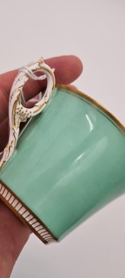 Lot 211 - A Royal Worcester porcelain cup and saucer
