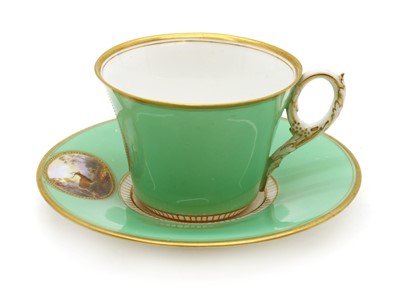 Lot 211 - A Royal Worcester porcelain cup and saucer
